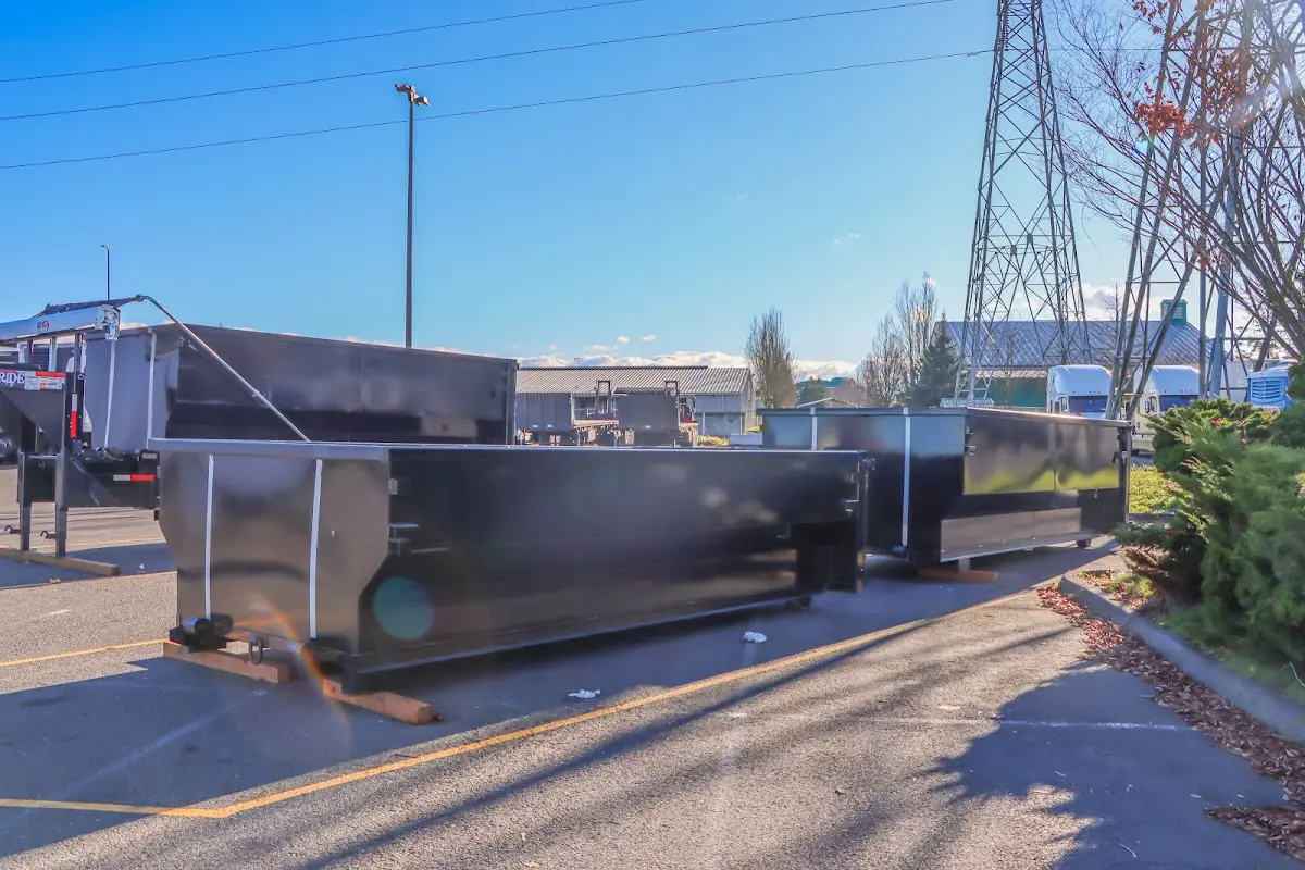 Roll-off dumpster ready for waste disposal at job site for Yard Waste Dumpster Rental in Rochester